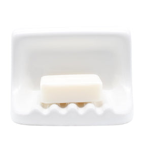 Hazzga white vintage ceramic soap dish mounted on shower wall keeps soap dry and reachable.