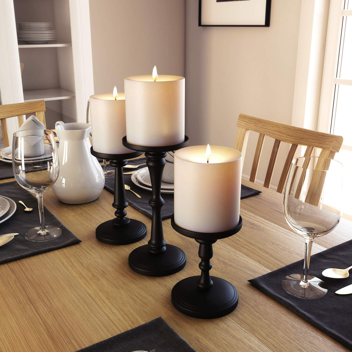 HB Design Co. matte black candle holders on fireplace mantel for warm ambiance.