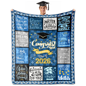 HCDER graduation blanket folded for gifting, compact warmth for travel.