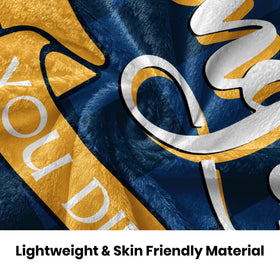 HCDER blanket on sofa for cozy study sessions and relaxation.