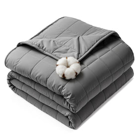 HCOIW weighted blanket on bed demonstrates even pressure for restful sleep