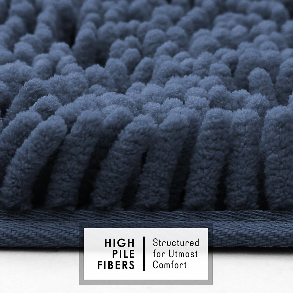 Hearth and Harbor bath rug with non-slip backing on smooth surface.