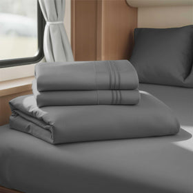 Hearth & Harbor dark grey RV short queen sheets set showing overall bedding in a camper bed for travel comfort