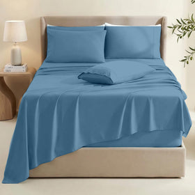 Flat sheet laid flat showing generous oversize for full coverage in Blue Heaven.