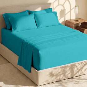Hearth & Harbor teal extra deep pocket queen sheets on bed for plush comfort