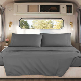 Hearth & Harbor RV short queen fitted sheet demonstrates secure elastic fit on mattress