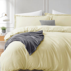 Hearth & Harbor Vanilla Yellow bed scene with inviting color and neat lines.