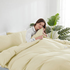 Hearth & Harbor Vanilla Yellow duvet ties secure the insert neatly.