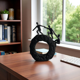 Hebdids circle-base sculpture showing stable base for secure shelf display.