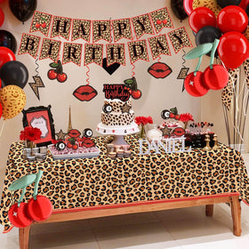 Heboland red cheetah tablecloth protects surfaces during celebrations.