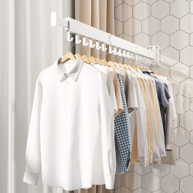 HEILAIYI versatile indoor/outdoor drying rack in a balcony setting.