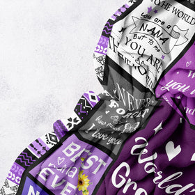 Folded Henazin Nana Gifts Blanket in purple, compact gift-ready presentation.