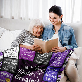 Henazin Nana Gifts Blanket draped over a sofa for cozy lounging.