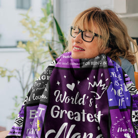 Nana wrapped in Henazin Nana Gifts Blanket showing all-season versatility.