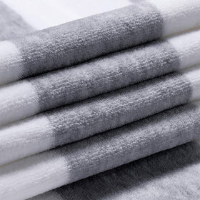 HENBAY quick-dry towel with soft velour finish for comfortable sunbathing.