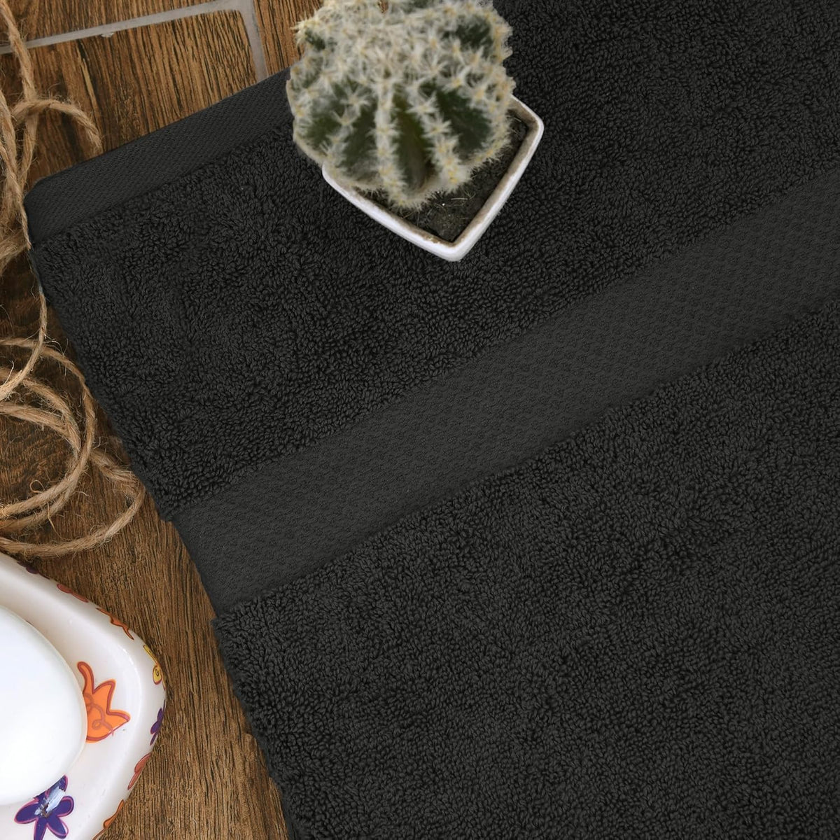 HERCULEAN Premium Bath Towels in machine-wash cycle, easy care maintains softness.