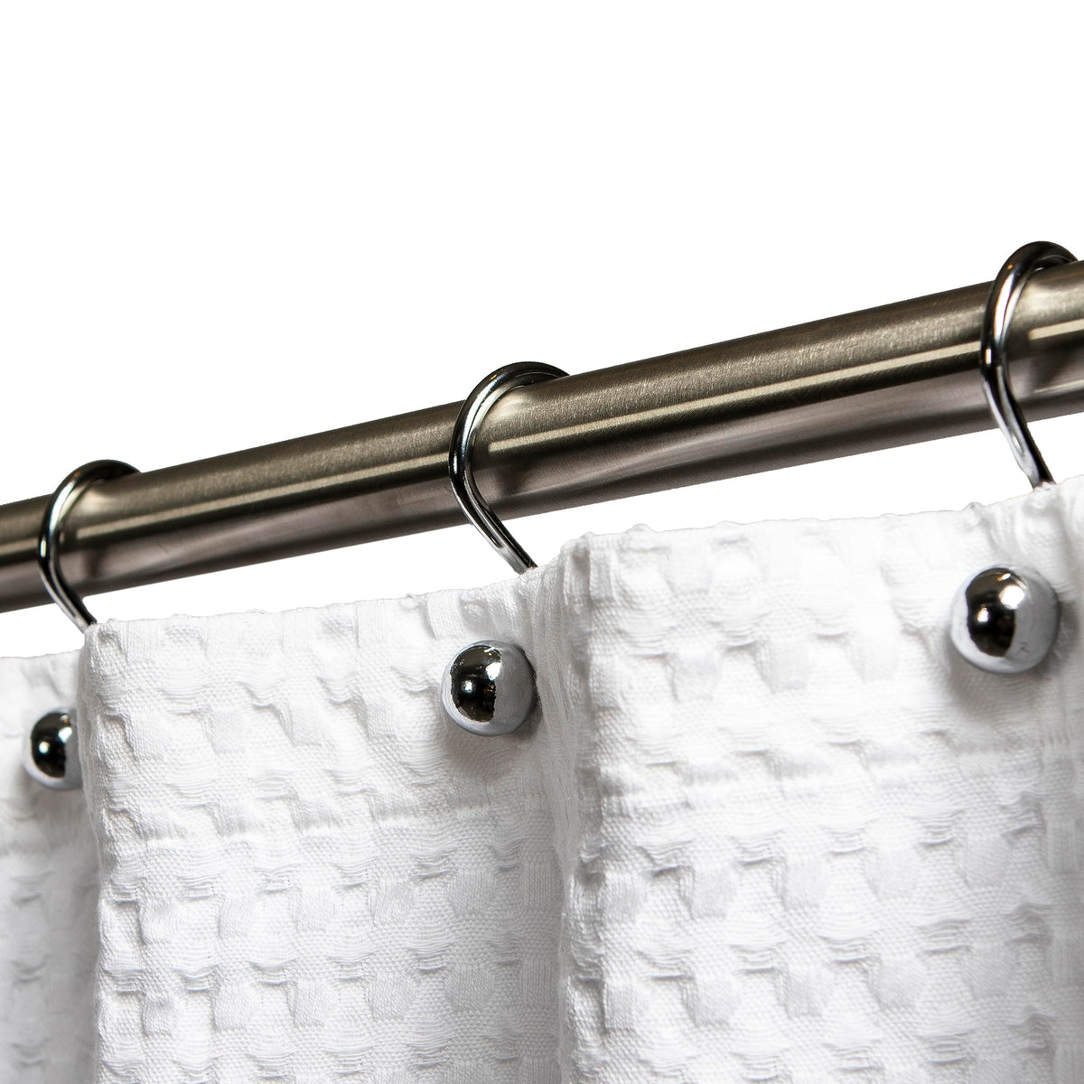 Hermosa Collection S curtain hooks in chrome finish securing a shower curtain