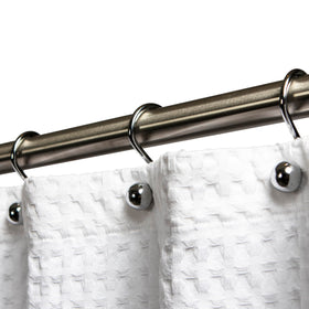 Hermosa Collection S curtain hooks in chrome finish securing a shower curtain