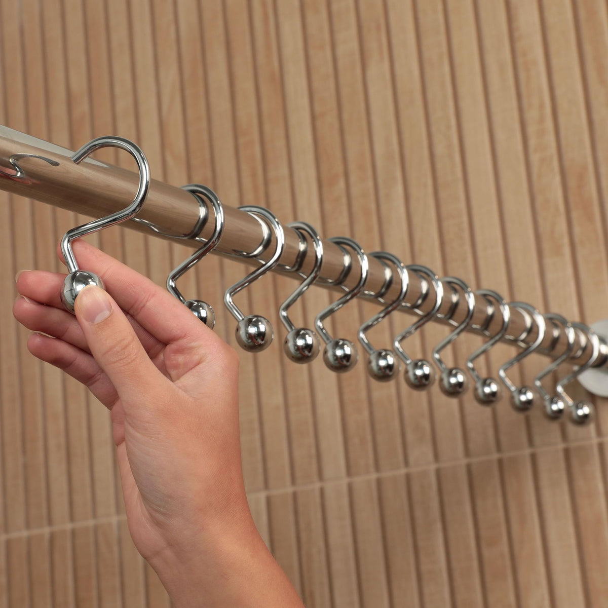 Hermosa Collection bathroom scene with chrome S curtain hooks