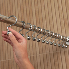 Hermosa Collection bathroom scene with chrome S curtain hooks