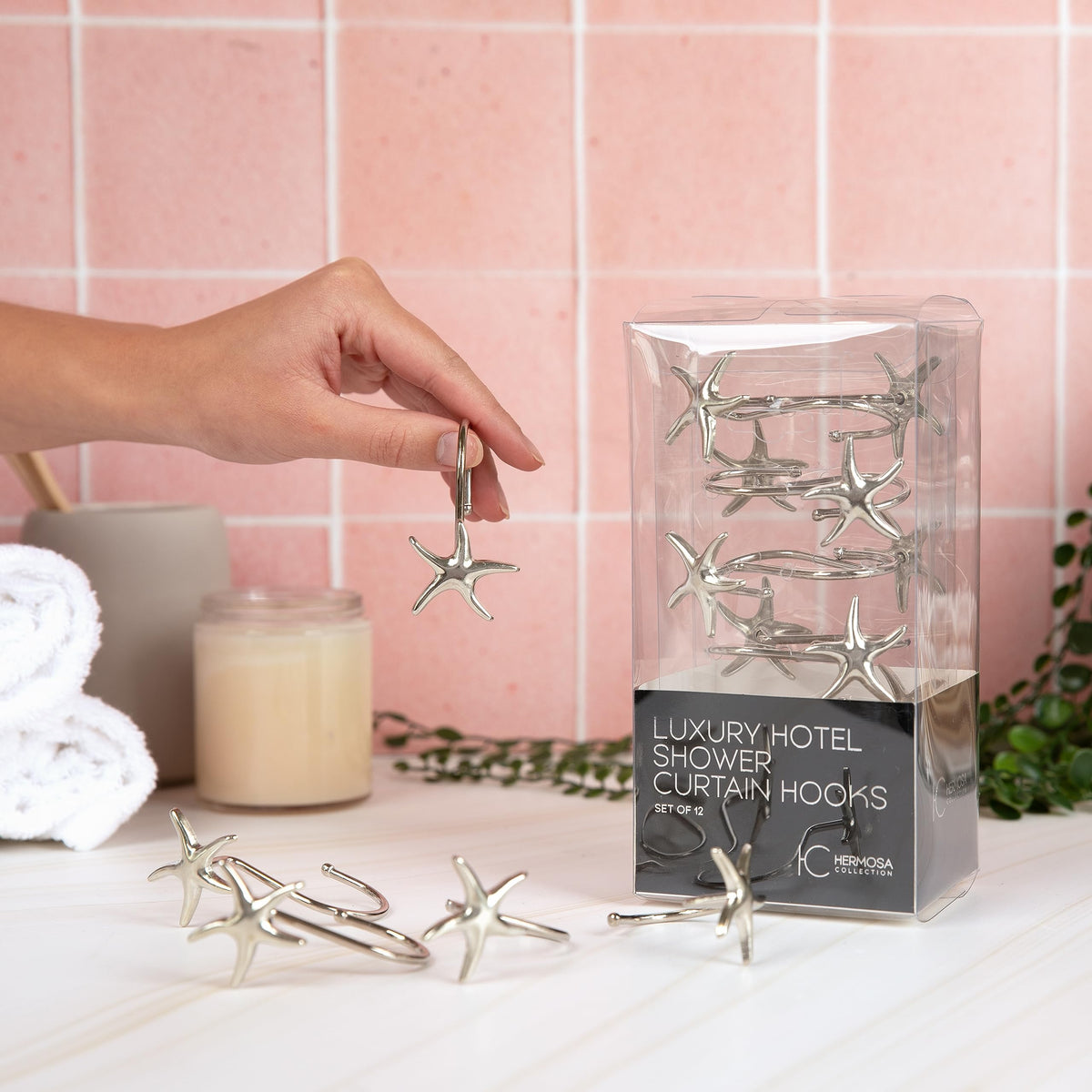 Hermosa Collection starfish shower hook on rod shows smooth sliding and secure curtain support.