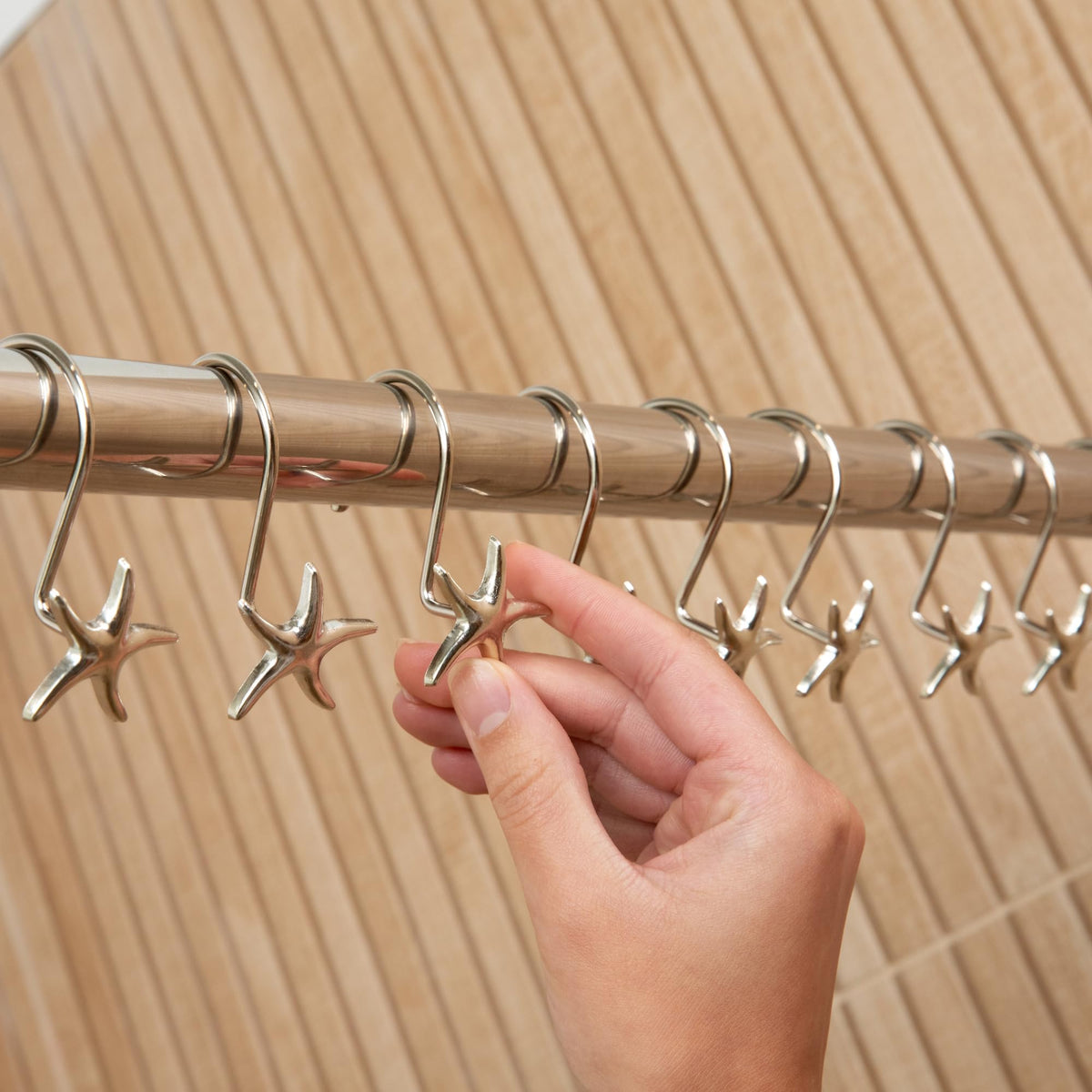 Hermosa Collection starfish shower hook pack in chrome-ready packaging.