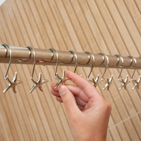 Hermosa Collection starfish shower hook pack in chrome-ready packaging.