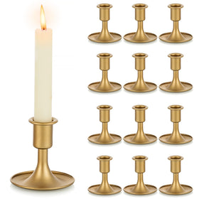 Hewory gold taper candle holder set of 12 on a dining table for an elegant centerpiece