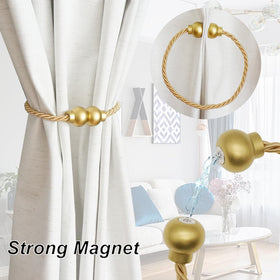 HIASTRA magnetic tiebacks close-up showing strong hold