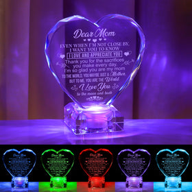 hibeauti crystal heart engraving glows softly on a nightstand
