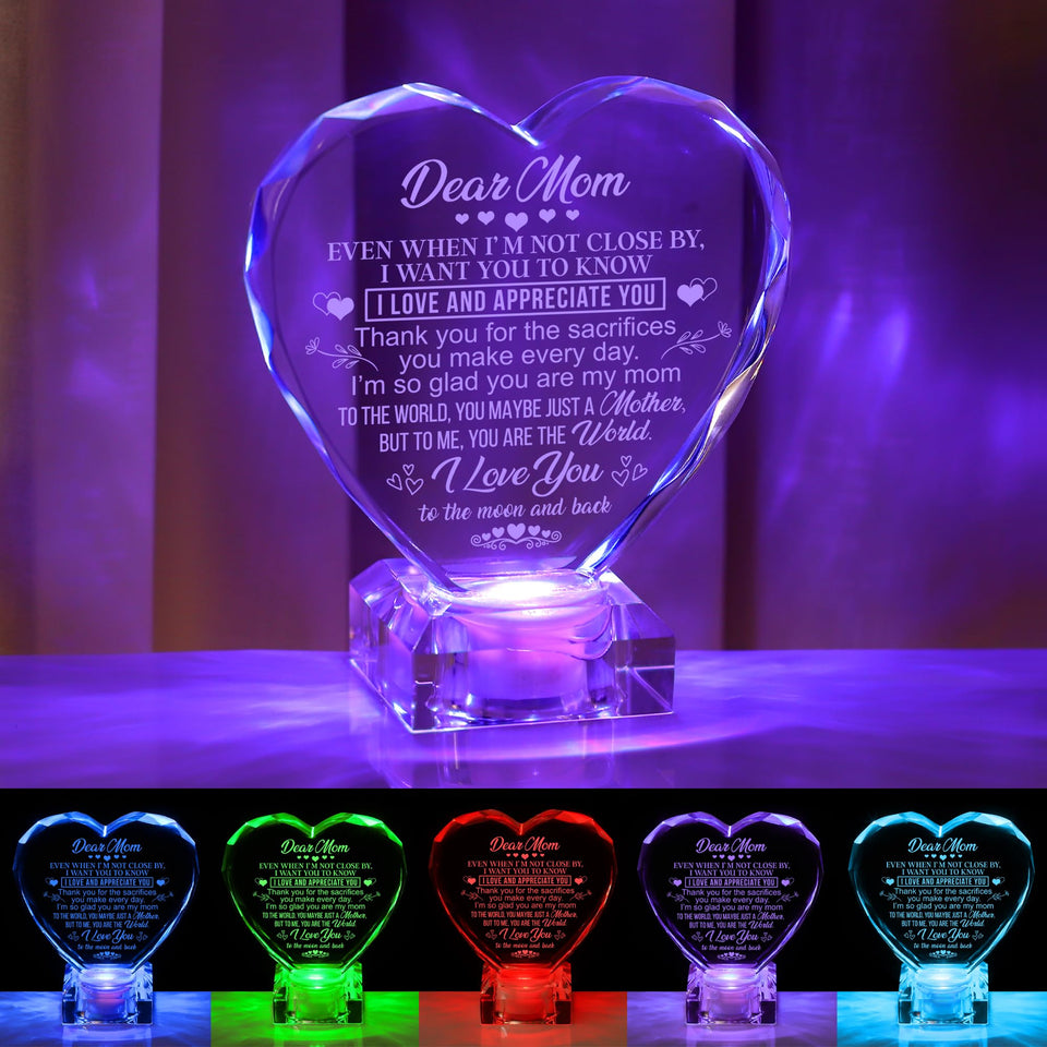 hibeauti crystal heart engraving glows softly on a nightstand