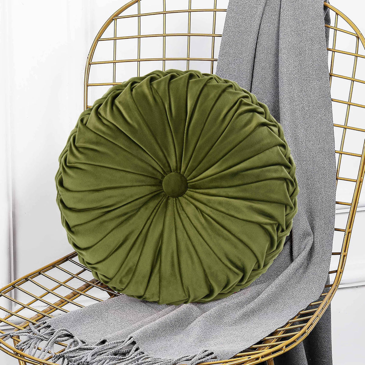 HIG Ripple olive round pillow on bed softens the room mood