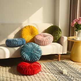 HIG yellow ruched velvet round pillow in dorm room adds study-friendly style.