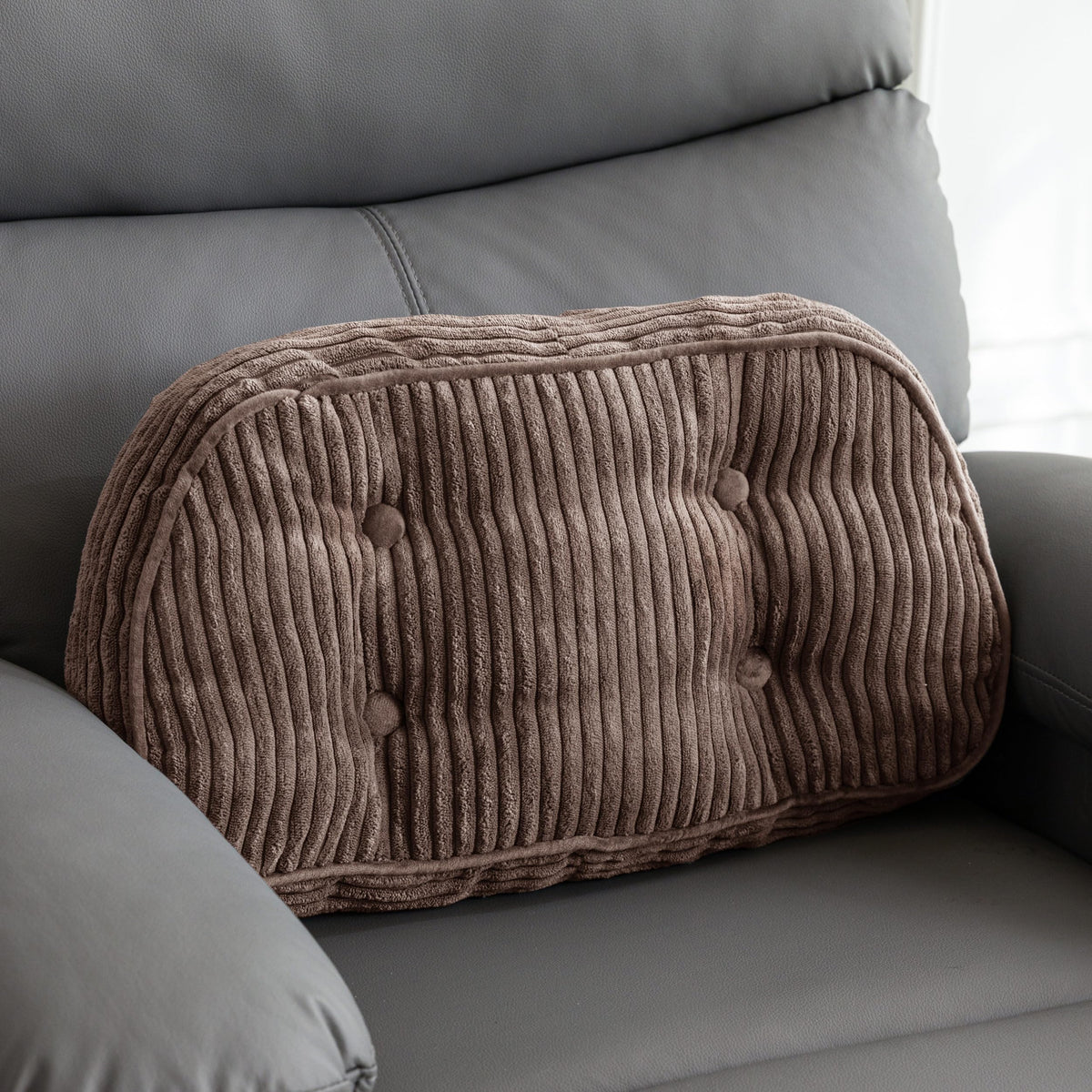 HIGOGOGO lumbar support pillow on a recliner provides steady back support and comfort.