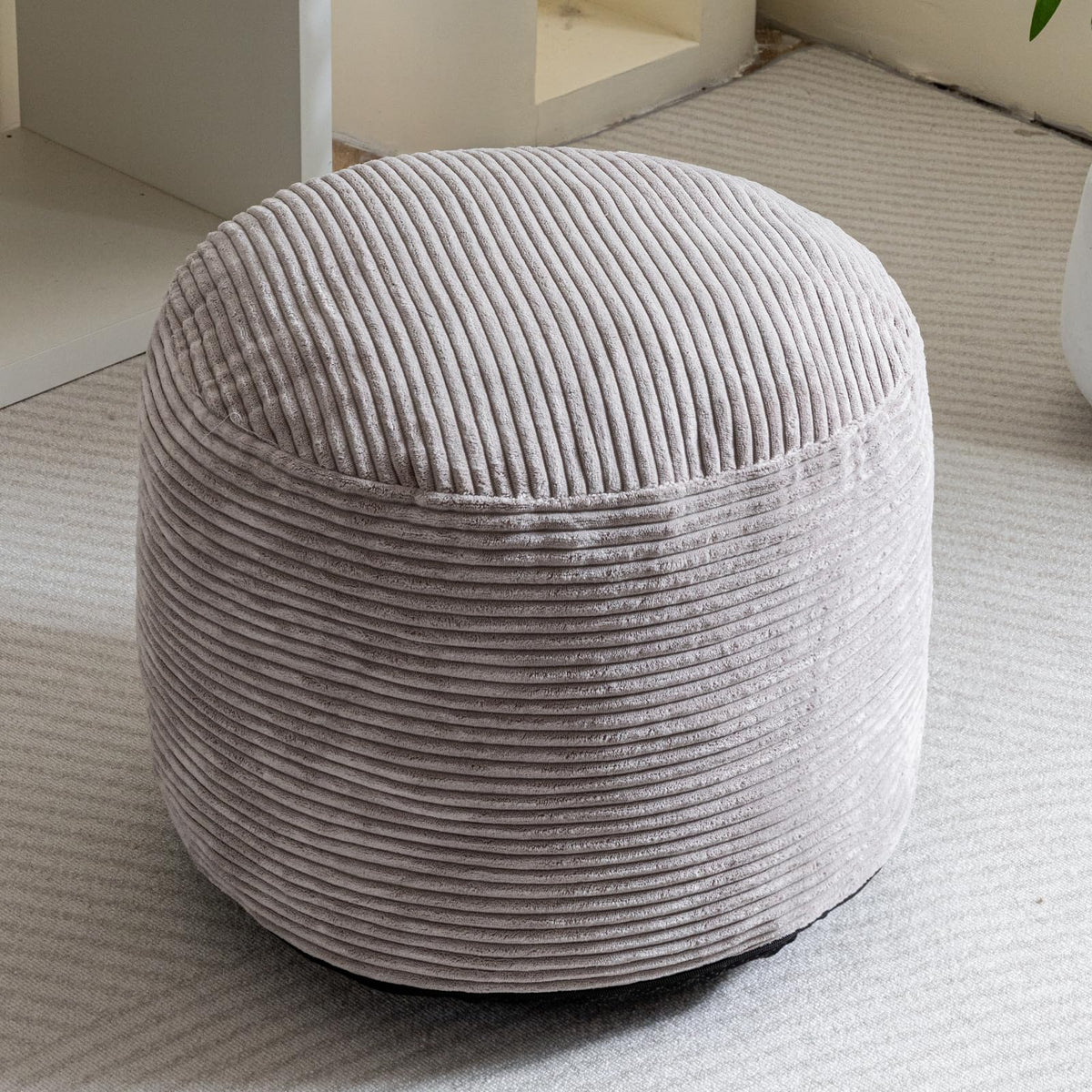 HIGOGOGO pouf doubles as extra seating in living areas.