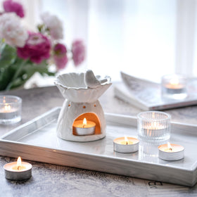 Hilumida unscented tea lights 200-pack spa setting enhance relaxation ambiance.