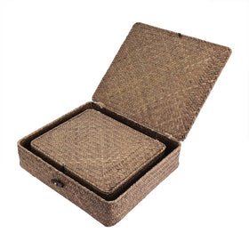 Hipiwe lidded seagrass basket hides clutter while adding natural style.