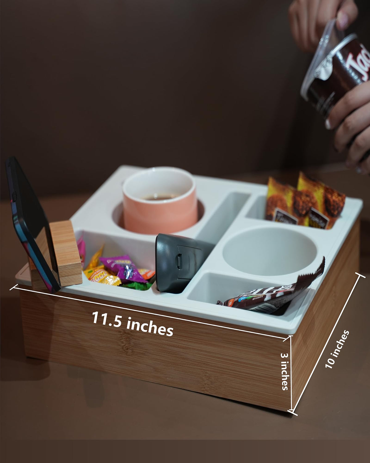 Hitseon couch cup holder tray offers storage partitions for remotes and snacks.