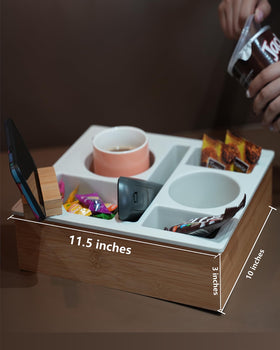 Hitseon couch cup holder tray offers storage partitions for remotes and snacks.