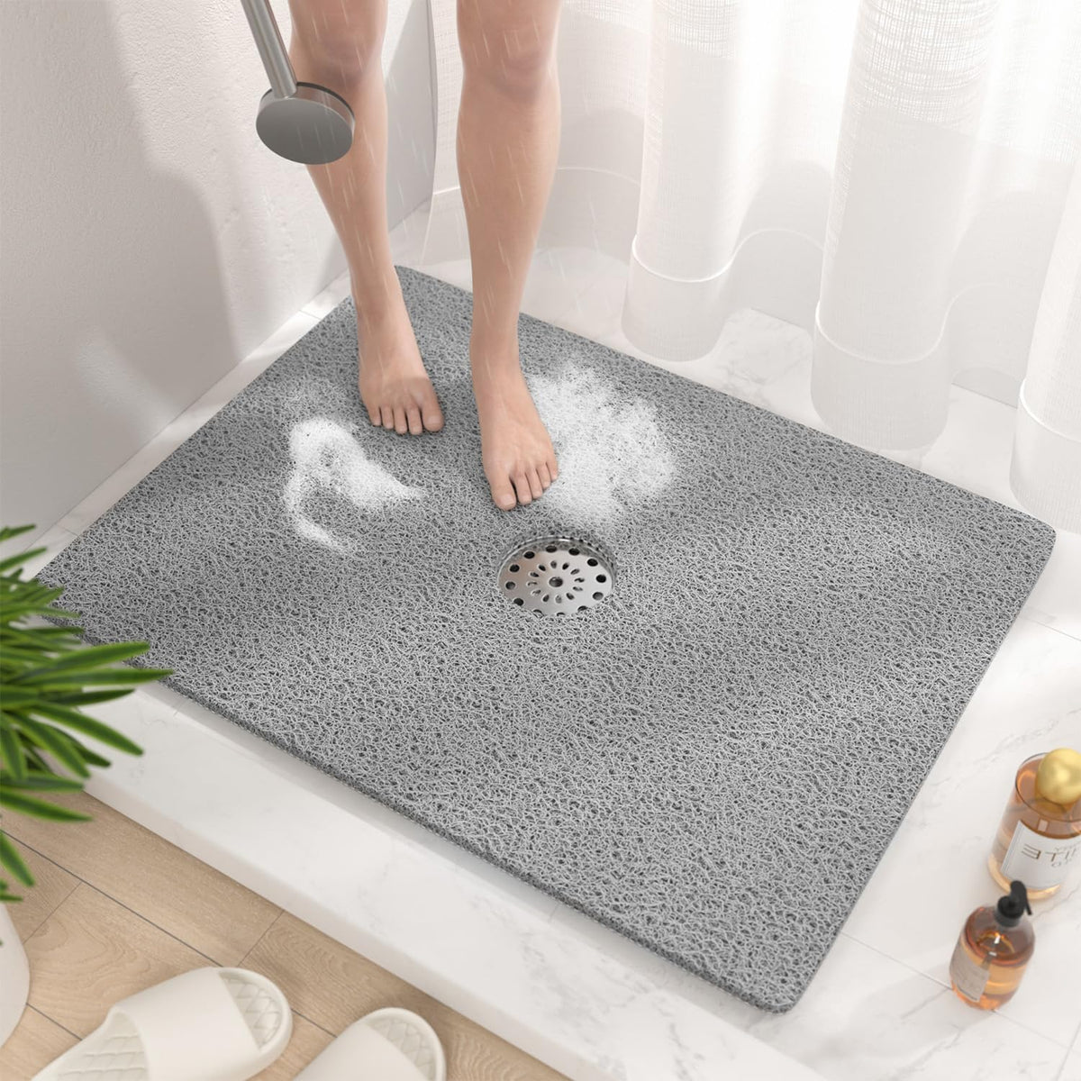 Hitslam shower mat 32x24 inch front view showing secure placement without suction cups