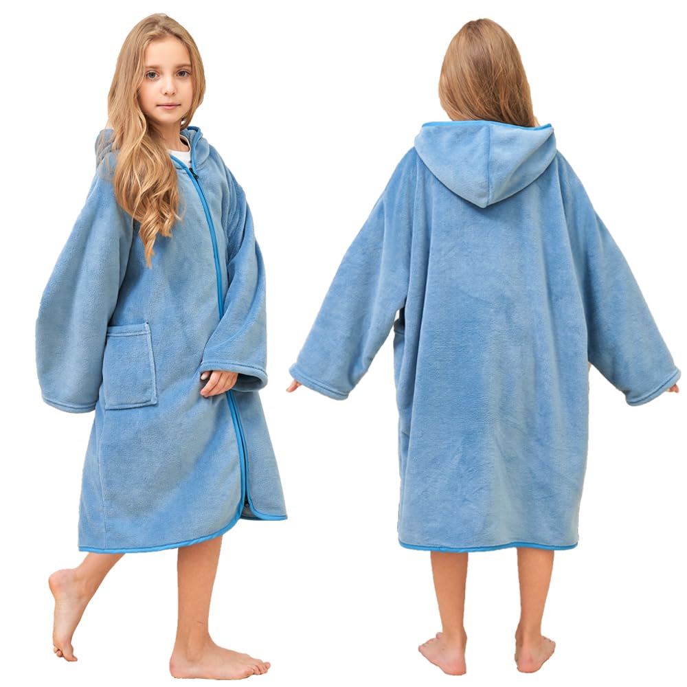 Hiturbo blue towel hoodie on beach setting after swimming
