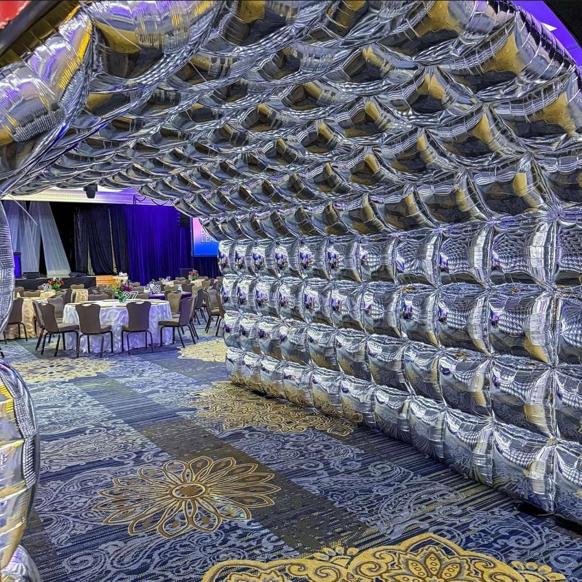 HKYOOD metallic silver balloons wall setup adapts to many themes.