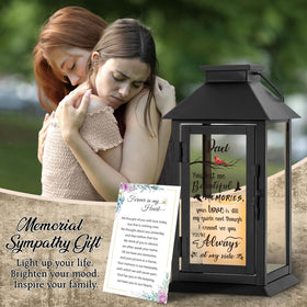 HN HAIINAA memorial lantern handle supports hanging or freestanding display.