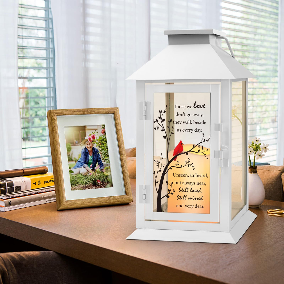 HN HAIINAA memorial lantern glass-card detail highlights cardinal motif for memory.