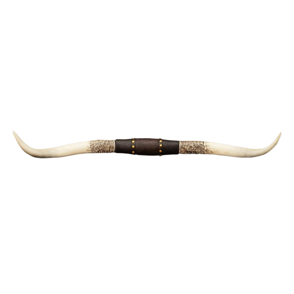 Hobby Lobby Longhorn wall decor with distressed horns creates a rustic focal point.
