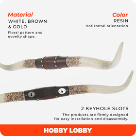 Hobby Lobby Longhorn wall decor leather strap and floral embossing for country charm.