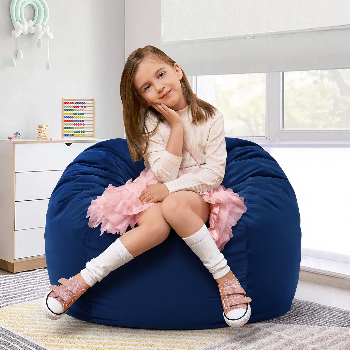 Hobestluk 2.5ft memory foam bean bag chair provides cozy reading and playtime comfort.