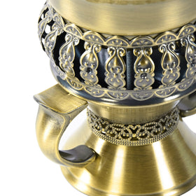 HOCUROAY Bakhoor burner includes metal tongs for safe handling.