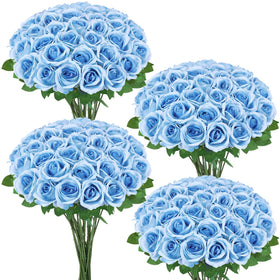 Hoemwarm sky-blue roses brighten any centerpiece display.