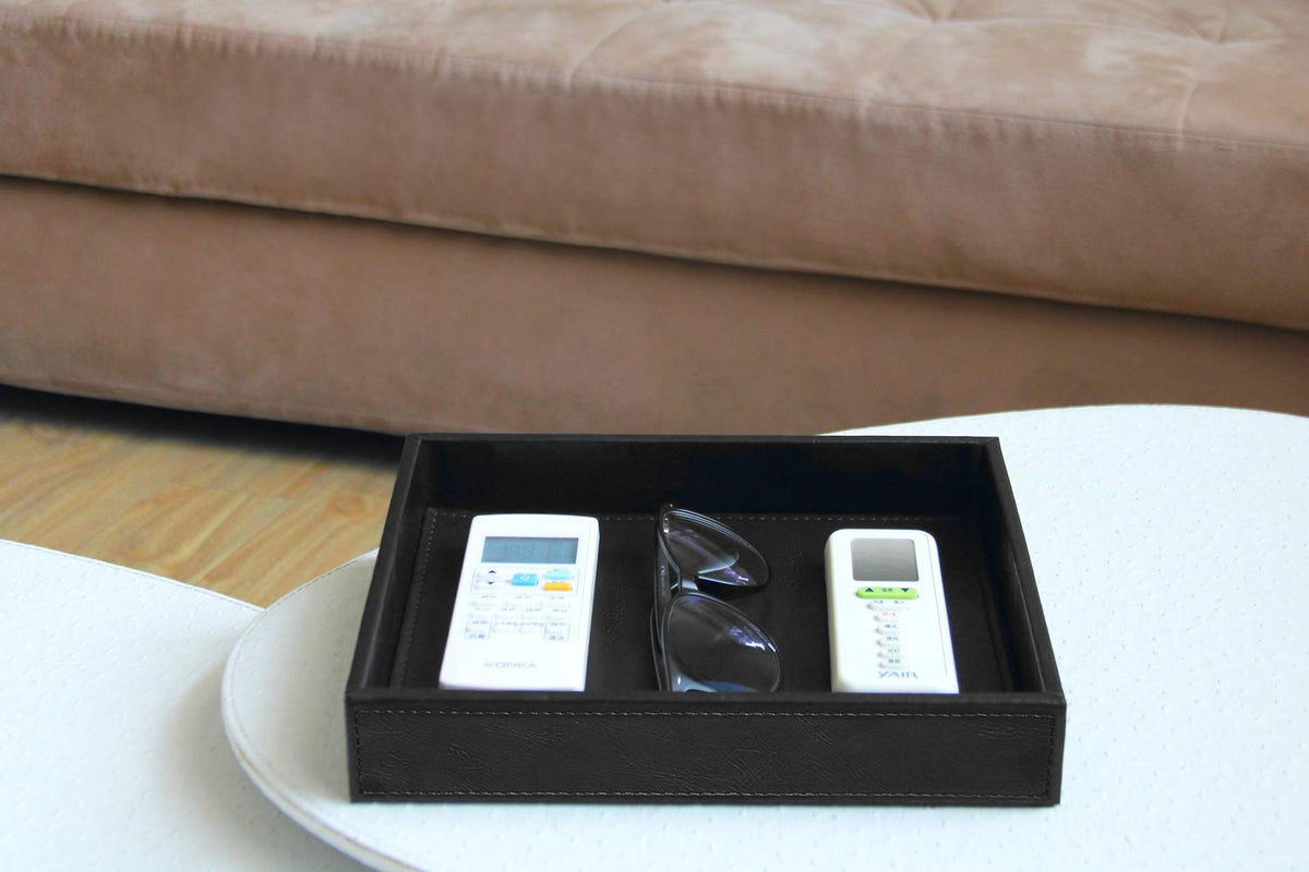 HofferRuffer black vanity tray saves counter space on a busy surface